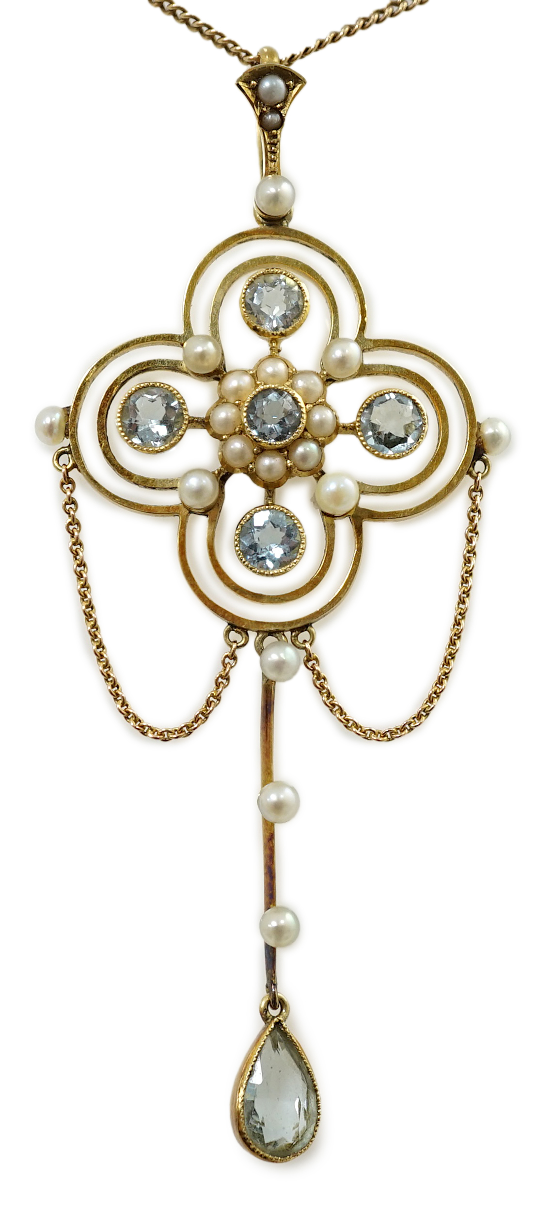 An Edwardian 15ct gold, aquamarine and seed pearl cluster set drop pendant, on a 15ct gold fine link chain